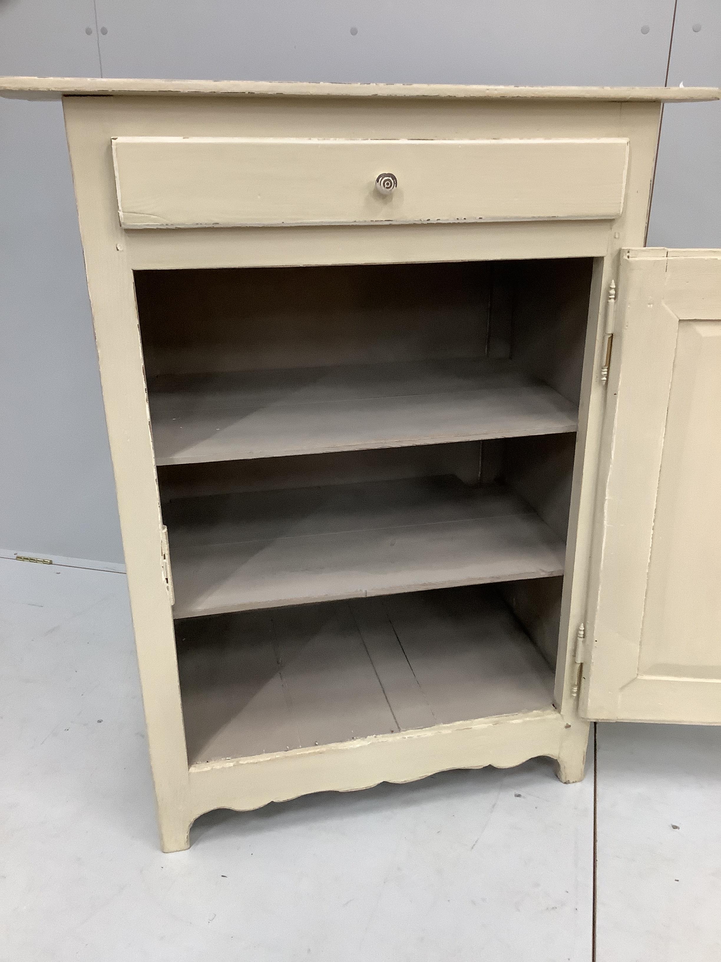 A 19th century Continental painted pine side cabinet, width 94cm, depth 52cm, height 122cm